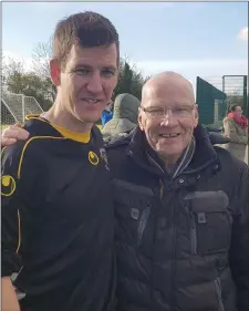  ??  ?? Tommy Earls, grandson of the late Tommy Earls of Wicklow soccer fame and current member of the Kilkenny Oscar Traynor team, pictured with Jim McLaughlin afte the game.