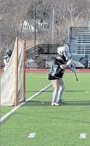  ?? NICK MALLARD / SENTINEL & ENTERPRISE ?? Fitchburg State sophomore netminder Francesca Reyes prepares for a shot during Thursday’s practice.