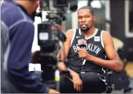  ?? Mike Lawrie / Getty Images ?? The Nets’ Kevin Durant speaks to the media during media day Sept. 27 at HSS Training Center in New York.