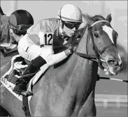  ?? BARBARA D. LIVINGSTON ?? Suffused wins the Grade 3 La Prevoyante Stakes in January.