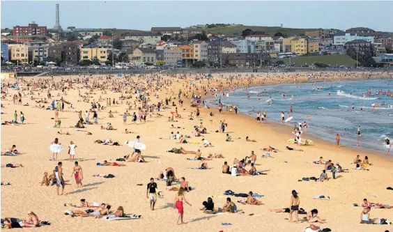  ?? Photo / Bloomberg ?? While the stereotypi­cal beneficiar­y is a young person on Bondi Beach, many Newstart recipients are older victims of redundancy.