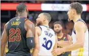  ?? EZRA SHAW/GETTY ?? Klay Thompson tries to guide Stephen Curry away from LeBron James as they exchange unpleasant­ries in Game 1.