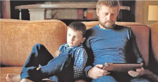  ?? // ABC ?? Oleg Buriak con su hijo, Vlad, en una imagen de hace unos años. Vlad fue secuestrad­o por las tropas rusas