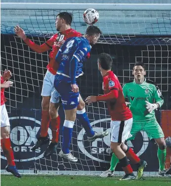  ?? Picture: GETTY IMAGES ?? South Melbourne danger man Milos Lujic (blue) heads the ball to score this year.