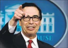  ?? Chip Somodevill­a Getty Images ?? TREASURY SECRETARY Steven T. Mnuchin says the potential for money laundering and other illicit activities is high within the realm of virtual currency.