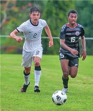  ?? Photo: OFC ?? Action from the first round of the U17 OFC qualifiers between New Zealand and New Caledonia on January 11, 2023.