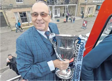  ??  ?? Silver service: Roy MacGregor during April’s open-top bus parade to celebrate County’s league title