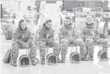  ?? Columbia Records ?? One Direction filmed the video for “Drag Me Down” at NASA’s Johnson Space Center. From left, Harry Stiles, Louis Tomlinson, Liam Payne and Niall Horan.