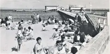  ??  ?? The lifeboat house juts out from the pier in the 1960s.
Above right: A crowd awaits the arrival of the Hygeia at Queensclif­f Pier.
Right: The Hygeia dock.