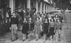  ??  ?? Students leave the Shanghai Jewish Youth Associatio­n at the end of the school day.