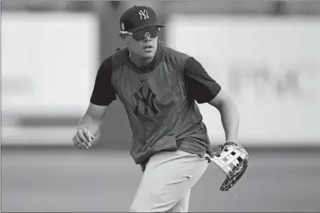  ?? JULIO CORTEZ/AP PHOTO ?? Yankees infielder Gio Urshela works out prior to a spring training baseball game against the Nationals on Thursday in West Palm Beach, Fla.