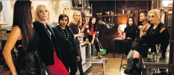  ??  ?? Sandra Bullock, left, Cate Blanchett, Mindy Kaling, Sarah Paulson, Awkwafina, Anne Hathaway, Rihanna and Helena Bonham Carter sink from their own profession­alism in Ocean’s 8.