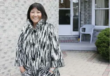  ?? ANDREW FRANCIS WALLACE/TORONTO STAR ?? May Lee, who has lived in the north Scarboroug­h area for 31 years, says Toishan, a dialect similar to Cantonese, used to be spoken by almost everyone on her street. “They’re all Mandarin now,” she says.