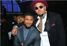  ??  ?? Usher and Chris Brown