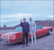  ?? SUBMITTED PHOTO ?? Australian photograph­er Jonathan May and his alien, Trevor, on the Burin Peninsula earlier this summer.