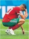  ?? PAUL ELLIS/AFP/GETTY IMAGES ?? Morocco's forward Aziz Bouhaddouz reacts after his own goal against Iran.