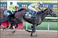  ?? The Sentine-Record/MARA KUHN ?? At the finish line, Classic Empire held a half-length advantage over Conquest Mo Money. He earned 100 Road to the Kentucky Derby points, enough to earn a spot in the Derby field.