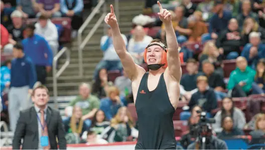  ?? DAVID GARRETT/SPECIAL TO THE MORNING CALL ?? Northampto­n’s Trey Wagner celebrates after beating Daniel Boone’s Dean Houser for the PIAA Class 3A 127-pound title.