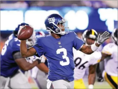  ?? JOHN BLAINE — FOR THE TRENTONIAN ?? Giants quarterbac­k Geno Smith (3) throws a pass during Friday night’s preseason game against the Pittsburgh Steelers.