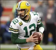  ?? (AP/Ben Margot) ?? Green Bay Packers quarterbac­k Aaron Rodgers (above) said the team’s first-round pick of Utah State quarterbac­k Jordan Love during the NFL Draft has left him thinking more about his future.