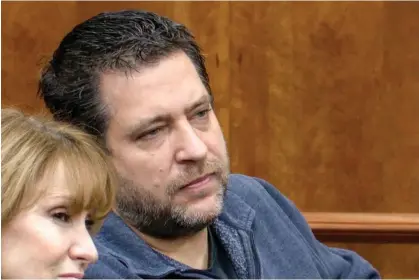  ?? ?? Chris Avell, right, pastor of Dad’s Place, sits in court in Bryan, Ohio, on 11 January. Photograph: AP