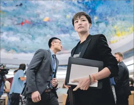  ?? Fabrice Coffrini AFP/Getty Images ?? HONG KONG singer Denise Ho took her cause to the United Nations Human Rights Council in Geneva this week. She is among the performers who have run afoul of Chinese authoritie­s because of their pro-democracy activism. But undeterred, she continues to speak out.