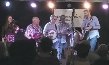  ?? Mark Zaretsky / Hearst Connecticu­t Media ?? The late Stacy Phillips’ old band, The Bluegrass Characters, playing a show at The Rough Draft at 295 Treadwell St. in Hamden.