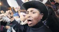  ?? PHOTO: REUTERS ?? Supporters of Peru’s President Martin Vizcarra celebrate outside the Congress building after the president shut down Congress in Lima yesterday.