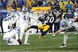  ?? KEITH SRAKOCIC / AP ?? Lions kicker Ryan Santoso (5) misses a field goal attempt during overtime of Sunday’s game against the Steelers in Pittsburgh.