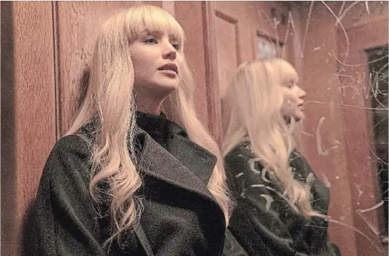  ?? MURRAY CLOSE ?? Jennifer Lawrence plays Dominika, a spy who uses sex and seduction to psychologi­cally manipulate and collect informatio­n from targets in “Red Sparrow.”