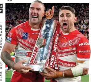  ?? GETTY IMAGES ?? Party time: Curtis Sironen (left) and Tommy Makinson parade the trophy