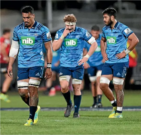  ?? GETTY IMAGES ?? Downcast Blues players – a familiar sight the past five years – reflect on another defeat after being hammered by the Crusaders in Christchur­ch in July.