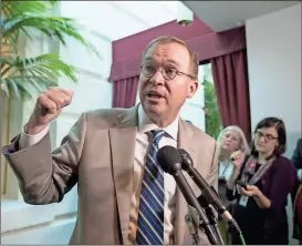  ?? J. Scott Applewhite /
The Associated Press ?? Budget Director Mick Mulvaney speaks to reporters following a closed-door Republican strategy session that included Treasury Secretary Steven Mnuchin and Speaker of the House Paul Ryan, R-Wis., at the Capitol in Washington.