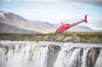  ??  ?? A helicopter pilot gets in close to film the kayaking scenes at Godafoss waterfall for Flyover Iceland.