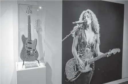  ?? Hans Gutknecht/tns ?? The new Shakira exhibition at the Grammy Museum in Los Angeles features some of the guitars she used while touring.
