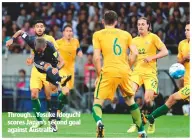  ??  ?? Through...Yosuke Ideguchi scores Japan’s second goal against Australia