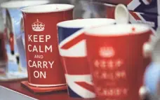  ?? CHRISTOPHE­R FURLONG, GETTY IMAGES ?? Tourist mugs in a shop in Whitehall in London offer soothing words to live by amid uncertaint­y about the effects of Brexit.