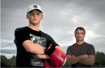  ?? GRANT MATTHEW/STUFF ?? After only 10 months of boxing, Jesse Mahony from Taranaki has won the Golden Gloves for novice elite 75kgs fighters. He is pictured with coach Mark Apanui.