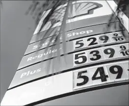  ?? Bloomberg ?? A TIGHT oil market will keep fuel prices above average, according to U.S. Energy Informatio­n Administra­tion projection­s. Above, a Shell station Tuesday in L.A.