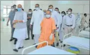  ?? PHOTO BY DEFENCE MINISTRY OFFICE ?? Defence minister Rajnath Singh and chief minister Yogi Adityanath inspecting the HAL Covid hospital at Haj house in Lucknow on Tuesday.