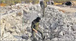  ?? AP ?? Rubble of houses near the village of Barisha in Idlib after an operation which targeted al-Baghdadi.