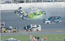  ?? PHELAN M. EBENHACK THE ASSOCIATED PRESS ?? Aric Almirola (10) avoided this crash, but not on the final lap of Sunday’s Daytona 500.