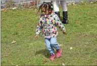  ??  ?? Children flooded Troy Central Little League field Saturday for an Easter Egg Hunt.