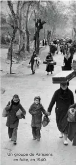  ??  ?? Un groupe de Parisiens
en fuite, en 1940.