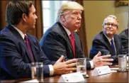  ?? DOUG MILLS / THE NEW YORK TIMES ?? President Donald Trump meets with newly elected governors Thursday, including Florida’s Ron DeSantis (left) and Ohio’s Mike DeWine.