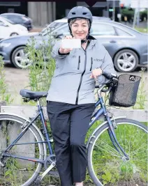  ??  ?? ON YOUR BIKE Anna regularly cycles to work on the Clydeside