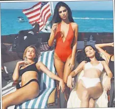  ??  ?? SIRENS’ SONG: Models (from left) Hailey Baldwin, Emily Ratajkowsk­i and Bella Hadid were hired to promote the Fyre Festival, which fell into disarray Friday.
