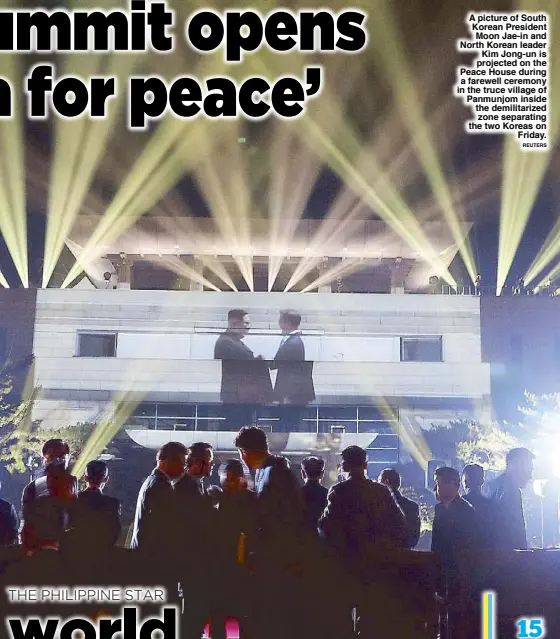  ?? REUTERS ?? A picture of South Korean President Moon Jae-in and North Korean leader Kim Jong-un is projected on the Peace House during a farewell ceremony in the truce village of Panmunjom inside the demilitari­zed zone separating the two Koreas on Friday.