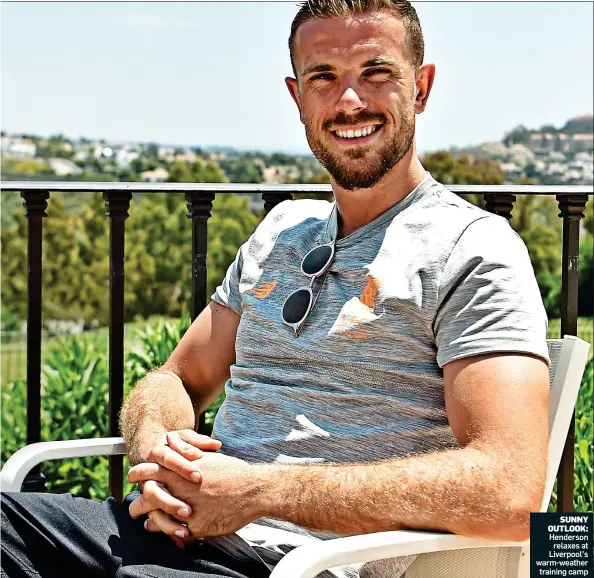  ??  ?? Henderson relaxes at Liverpool’s warm-weather training camp