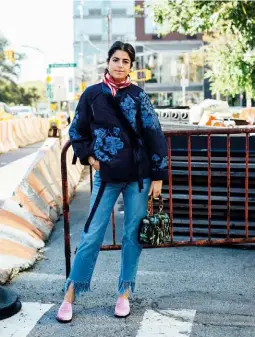  ??  ?? FRUITS OF LABOUR above: Man repeller founder leandra Medine at new york Fashion Week. left: embroidere­d raffia pump by Mr by Man repeller, available exclusivel­y at net-a-porter